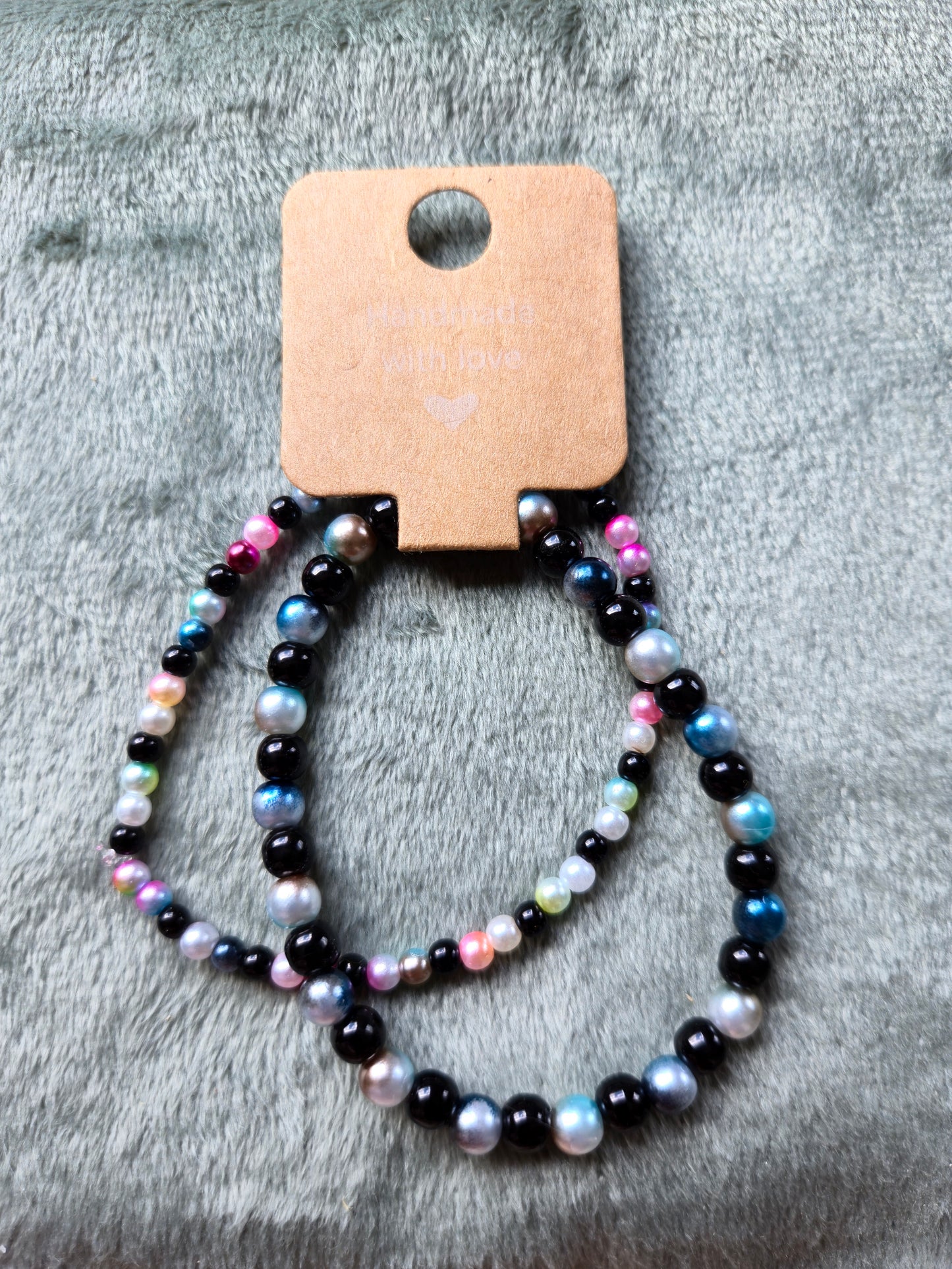 Black and multicolored beaded bracelets: set of two