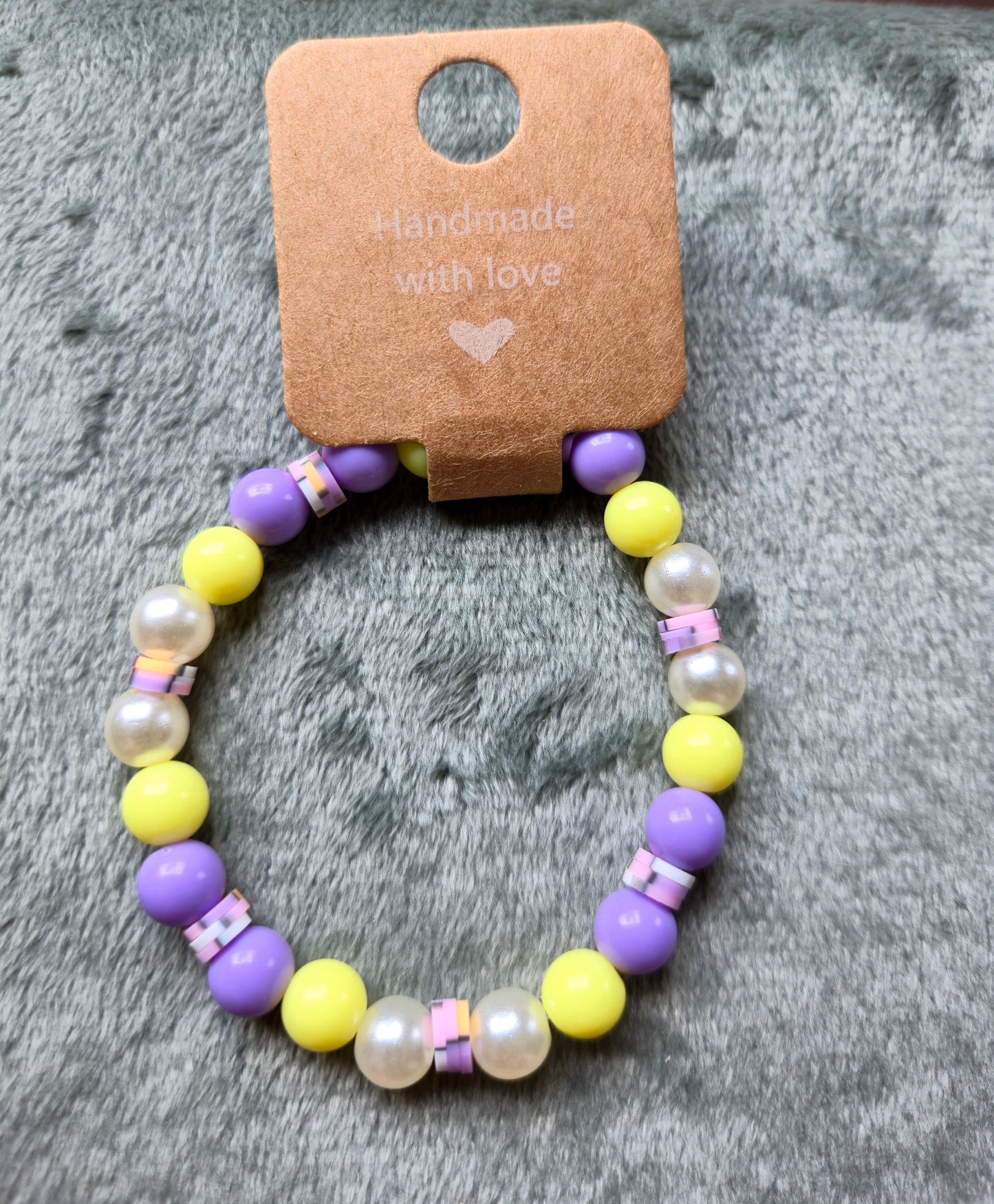 Purple and yellow beaded bracelet