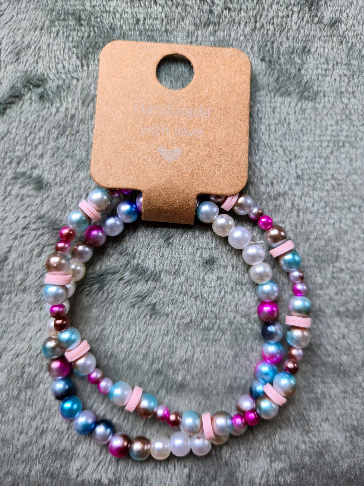 Multicolored pinks beaded bracelets: set of two