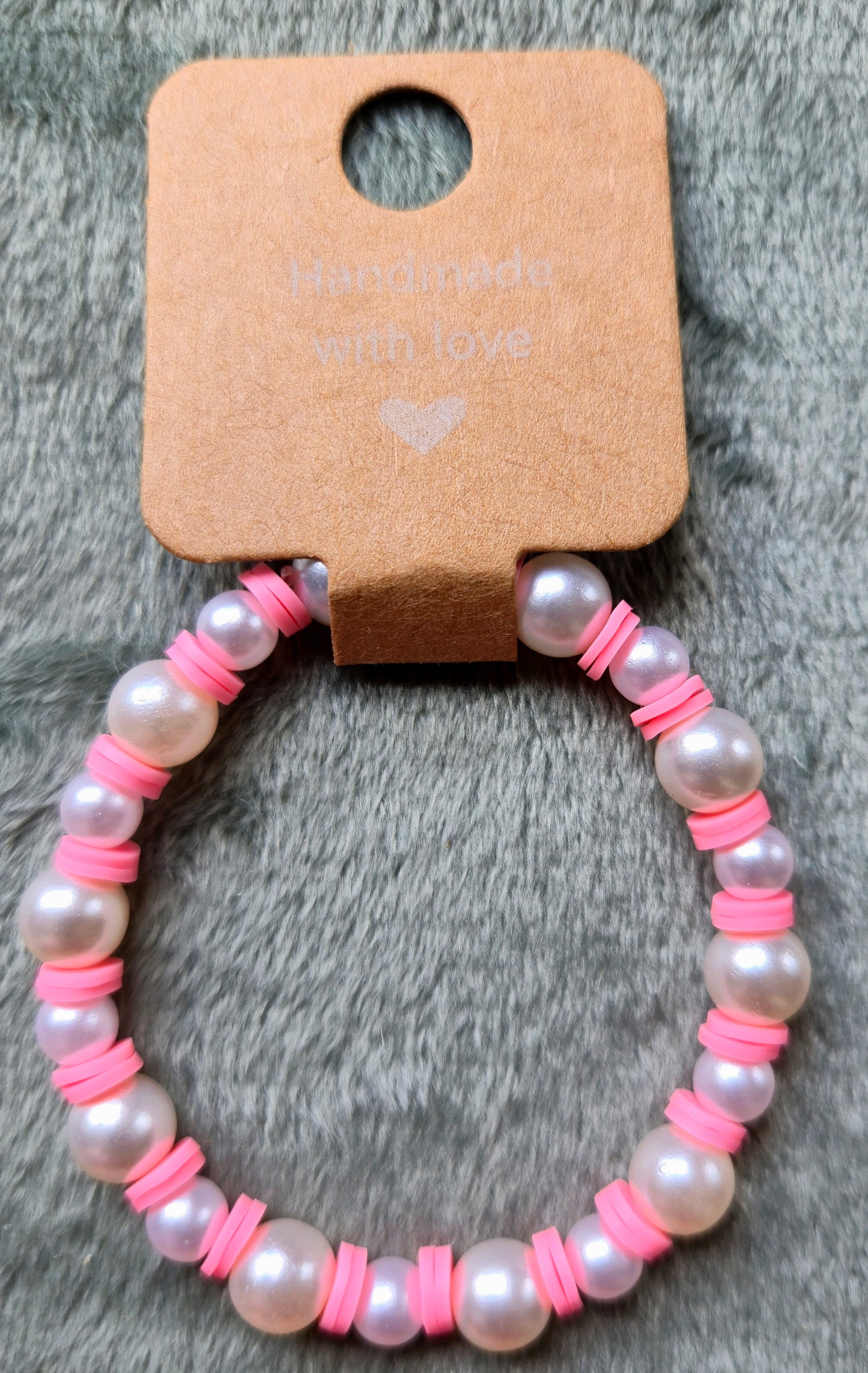 White and pink beaded bracelet
