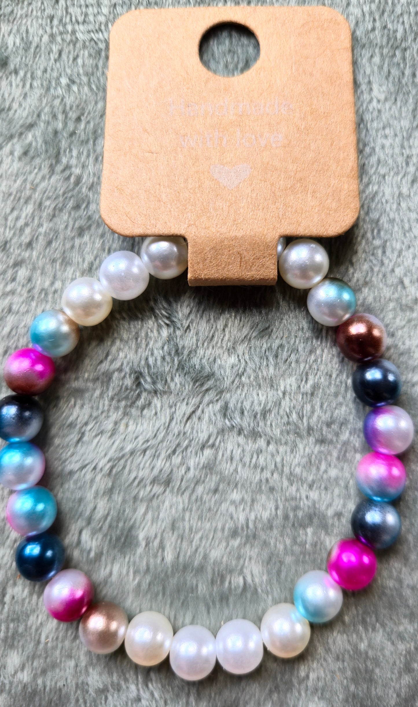White and multicolored beaded bracelet