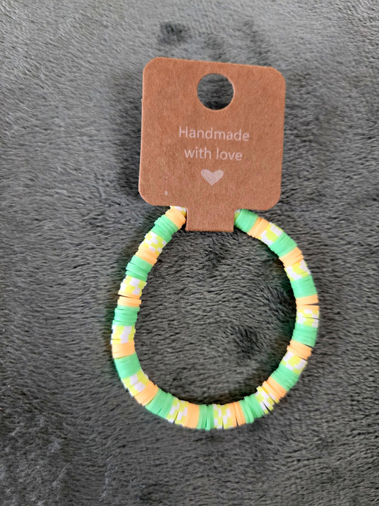 Green and orange clay beaded bracelet