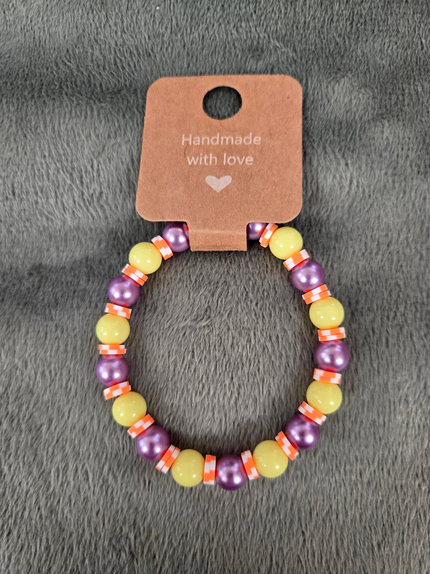 yellow, purple and orange beaded bracelet